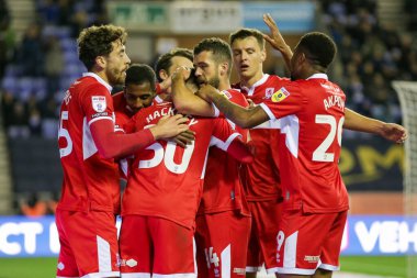 Middlesbrough 'lu Hayden Hackney, 19 Ekim 202' de Wigan Atletizm Şampiyonası 'nda Middlesbrough' a karşı oynanan Wigan-Middlesbrough maçında 1-3 kazanma golünü kutluyor.