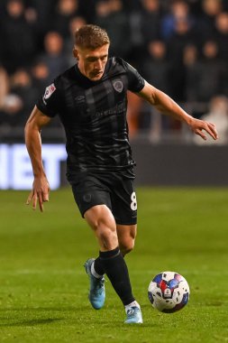 Hull City 'den Greg Docherty 19 Ekim 202' de Bloomfield Road, Blackpool 'da oynanan Blackpool-Hull City maçında topa vuruyor.