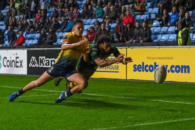 Avustralyalı Josh Addo-Carr, Coventry Building Society Arena, Coventry, İngiltere, 21 Ekim 202 'de oynanan 2021 Dünya Rugby Ligi Kupası karşılaşmasında bir deneme için sahaya çıkıyor.