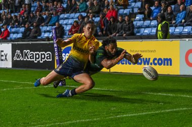 Avustralyalı Josh Addo-Carr, Coventry Building Society Arena, Coventry, İngiltere, 21 Ekim 202 'de oynanan 2021 Dünya Rugby Ligi Kupası karşılaşmasında bir deneme için sahaya çıkıyor.