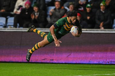 Avustralyalı Daly Cherry-Evans, 21 Ekim 202 'de Coventry Building Society Arena, Coventry, İngiltere' de oynanan 2021 Dünya Rugby Ligi Kupası karşılaşmasında bir deneme için sahaya çıkıyor.