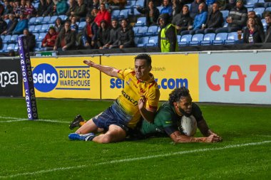Avustralyalı Josh Addo-Carr, Coventry Building Society Arena, Coventry, İngiltere, 21 Ekim 202 'de oynanan 2021 Dünya Rugby Ligi Kupası karşılaşmasında bir deneme için sahaya çıkıyor.