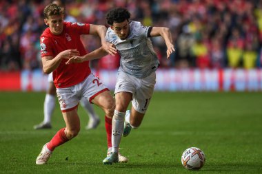 Liverpool 'dan Curtis Jones # 17 Premier League maçında Nottingham Ormanı' ndan Ryan Yates # 22 ile Liverpool City Ground, Nottingham, Birleşik Krallık 'ta Liverpool' a karşı 22 Ekim 202 'de karşılaştı.