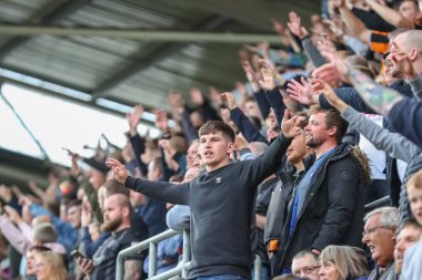 Hull City taraftarları, 22 Ekim 202 'de İngiltere' nin Rotherham Stadyumu 'nda oynanan ve Rotherham United ile Hull City arasındaki Sky Bet Şampiyonası maçında desteklerini göstermek için tezahürat yapıyorlar.