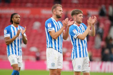 Huddersfield Town oyuncuları 22 Ekim 202 'de İngiltere' nin Middlesbrough kentinde oynanan Middlesbrough-Huddersfield Town maçında Huddersfield Town taraftarlarını alkışladılar.