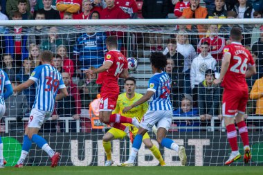 Middlesbrough 'dan Tommy Smith 14 numaralı forvet kalede önde ama 22 Ekim 202' de Middlesbrough, Middlesbrough, Birleşik Krallık 'taki Riverside Stadyumu' nda oynanan Middlesbrough-Huddersfield maçında kurtarıldı.