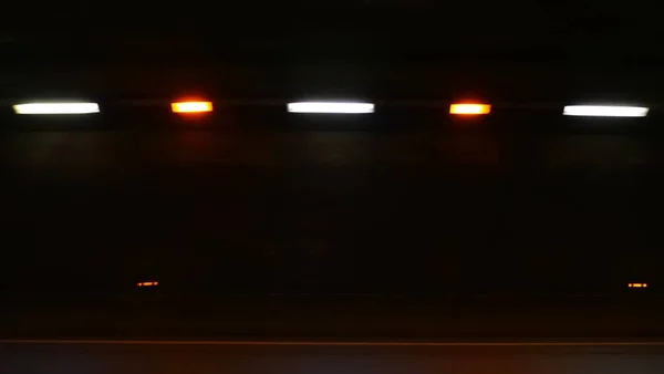 Lights on the road at night, speed effect