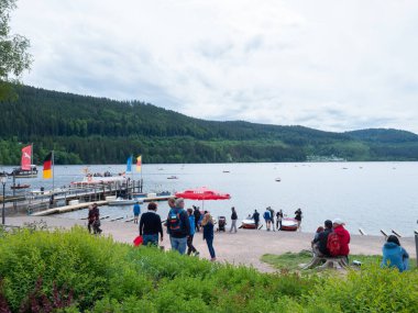 Titisee situated in the midst of the black forest, Germany, is a famous tourist attraction. A lot of people enjoy soujourning at the banks or undertaking a boat trip.