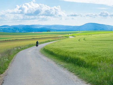 Cycling on Schwarzwald Panoramaweg offers rides through the open landscape of the black forest, Germany.