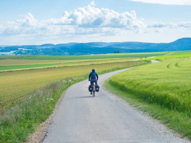Cycling on Schwarzwald Panoramaweg offers rides through the open landscape of the black forest, Germany.