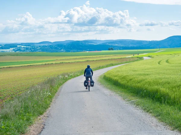 Cycling on Schwarzwald Panoramaweg offers rides through the open landscape of the black forest, Germany.