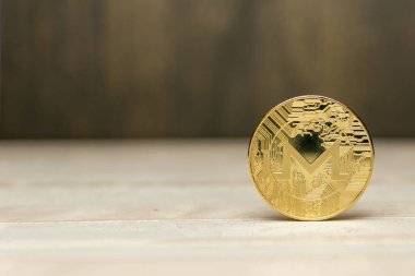  arka plan maded üzerinden dekoratif sıva üzerinde altın monero