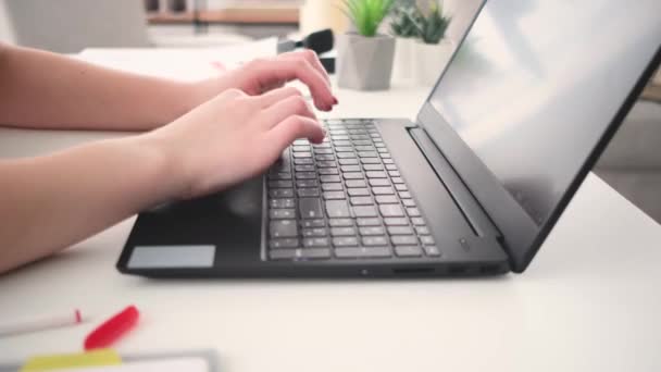Close up shot of female hands typing on keyboard — Stock Video
