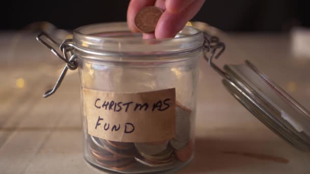 クリスマス休暇のためのお金を節約 — ストック動画