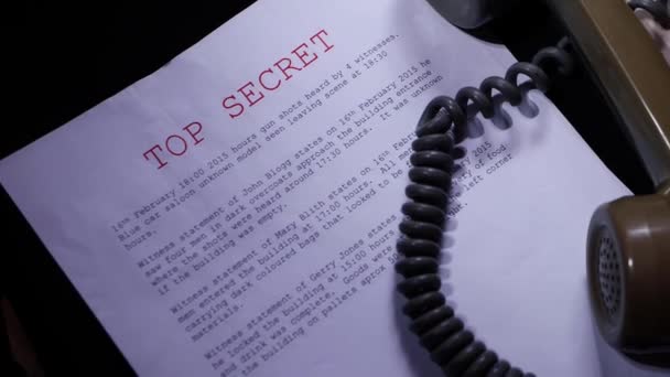 Documento secreto superior com telefone hotline — Vídeo de Stock