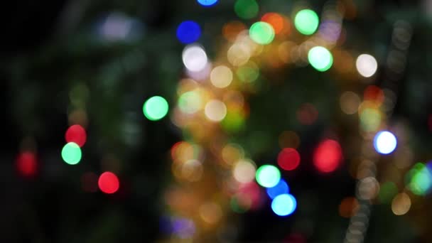 Πολύχρωμα χριστουγεννιάτικα φώτα διακόσμηση bokeh λάμψη — Αρχείο Βίντεο