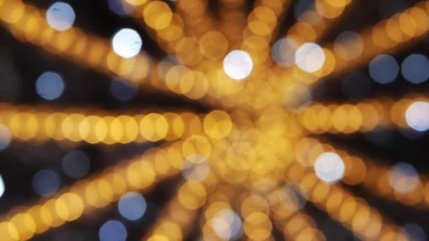 Oro colorido Navidad decoración luces bokeh parpadeo tiro desenfocado — Vídeos de Stock