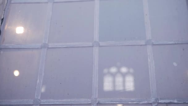 Traditional old leaded window in stone build English church window — Stockvideo