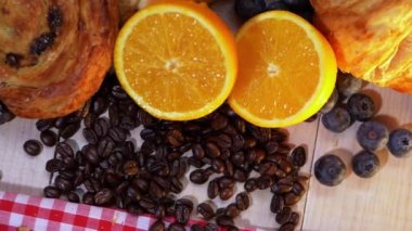 Breakfast of pastries fresh fruit and coffee
