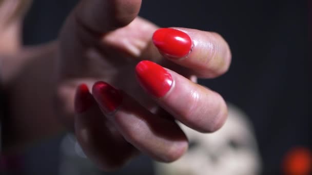 Halloween witch with long red finger nails — Stock Video