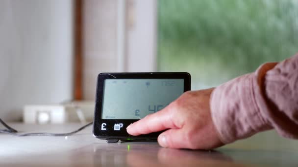 Checking Home Smart Meter Displayed Kitchen Counter Medium Shot Selective — 图库视频影像