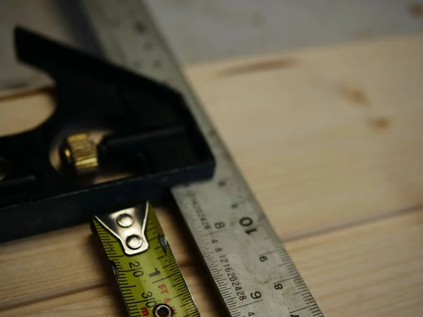 Carpenter Tools Square Tape Measure Wooden Background Close Shot Selective — Foto Stock