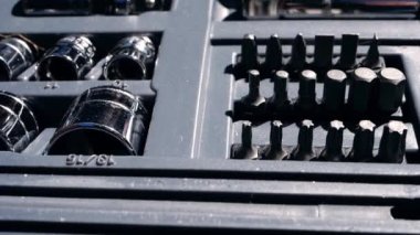 Socket set in tool box for repair works medium panning shot selective focus