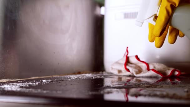 Hand Spraying Cleaning Fluid Dirty Work Surface Medium Shot Slow — Stok video