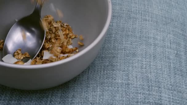 Pouring Granola Breakfast Bowl Close Slow Motion Shot Selective Focus — Vídeo de Stock