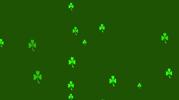 緑の背景アニメーション壁紙に浮かぶアイルランドのシャムロックシンボル — ストック動画