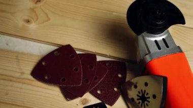 Power multi tool with attachments for woodwork overhead dolly 4k shot close up selective focus