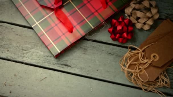 Christmas Background Gift Bag Tags Distressed Wood Background Medium Overhead — Stock videók