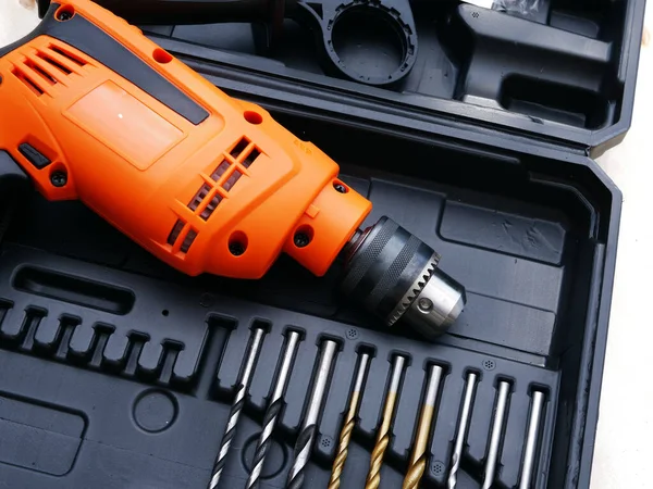 Electric power drill with bits for diy close up shot selective focus