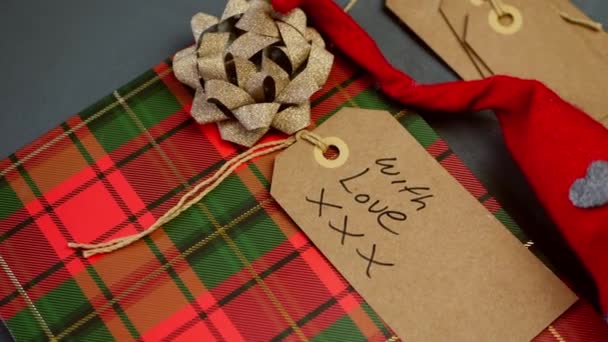 Christmas Background Gift Bag Tags Gray Background Medium Overhead Shot — Video