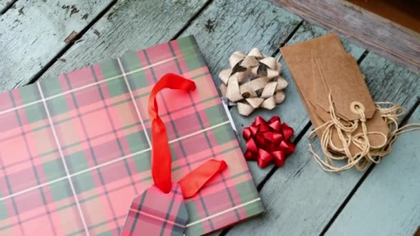 Christmas Background Gift Bag Tags Distressed Wood Background Medium Overhead — 图库视频影像