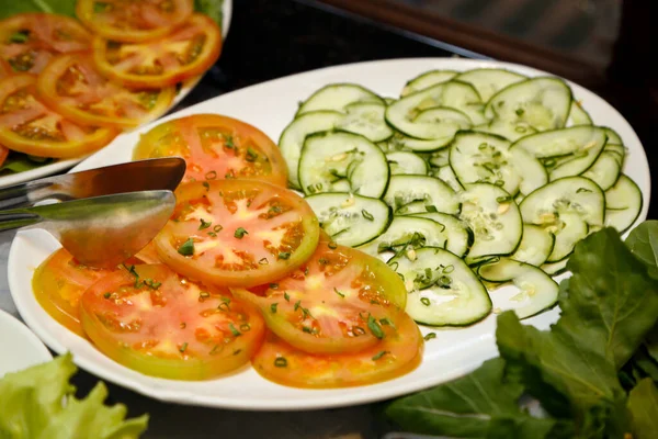 stock image salad with tomato and cucumber ready to serve on the plate