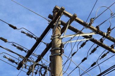 concrete pole with electrical power, telephony and fiber optic cabling - electricity concept