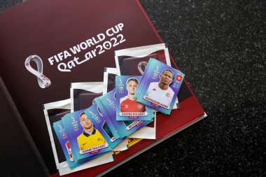 Minas Gerais, Brazil - September 07, 2022: Selective focus of stickers and Panini 2022 FIFA World Cup Qatar Official licensed sticker album