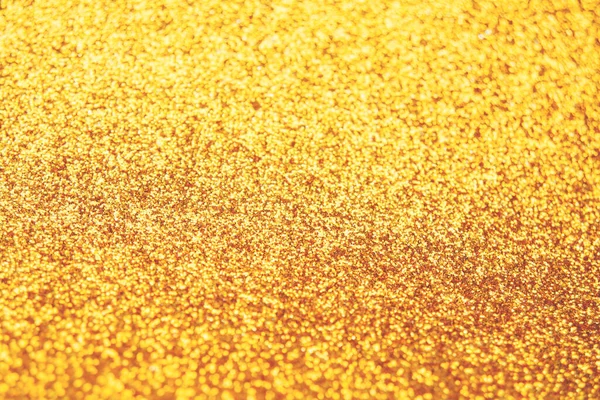 Abstrakcyjne błyszczące, zamazane, złote tło. Teksturowane błyszczące tło — Zdjęcie stockowe