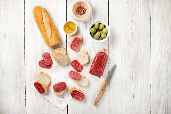 Tasty Sandwich Baguette Sausage Salami Olives Fast Breakfast Coffe Break — Stock Photo, Image