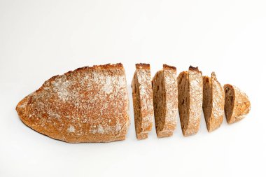 Sliced bread isolated on a white background. Bread slices viewed from above. Top view. Food concept