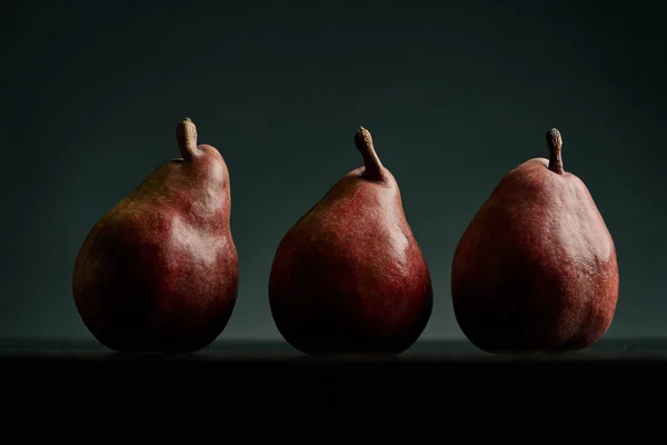 Three Red Pears Black Table High Quality Photo — Foto de Stock
