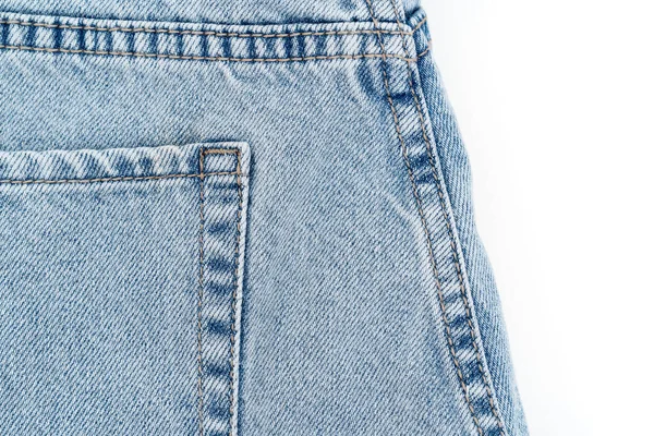 浅蓝色斜纹棉布牛仔裤衬裤的一部分，在白色背景下隔离 — 图库照片