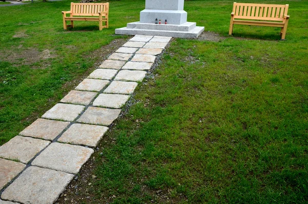 stepping path of concrete tiles in the lawn straight row of concrete walkway in city park garden spring light white color tiles and green grass, road to bend, england statue, stone, bench