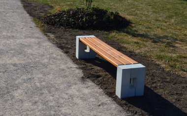 pedestrian path newly built compacted stone aggregate permeable surface soft for runners pedestrian cycle path forest path, park bench