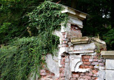 renovation of damaged, broken and stolen tombstones. pre-war runic letters with the names of the dead. rusty and green oxidized grids and lanterns, the collectors of precious metals cut and sold