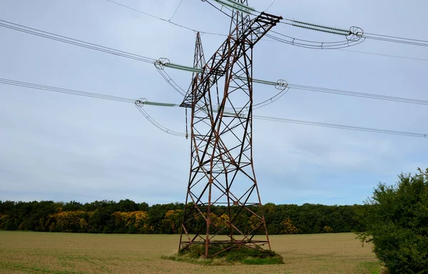 electrical network huge long line. feeds the entire network from the power plant. the danger of blackout scares every household. city without electricity where no energy flows anymore. glass insulator