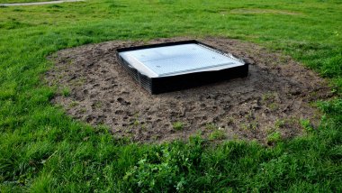 a hinged hatch with a patent lock to the underground of the city, where there are collector shafts with engineering networks. or the facility and subway entrance directly from the sidewalk