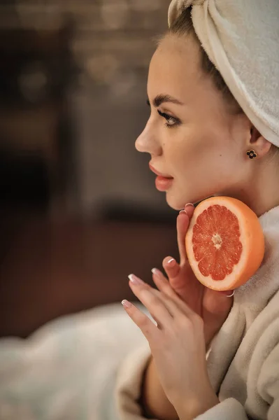 Beautiful Young Woman Towel Her Head Holding Lemon Bathroom — Stock Photo, Image