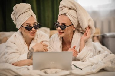 beautiful women in bathrobe and towel in the morning.
